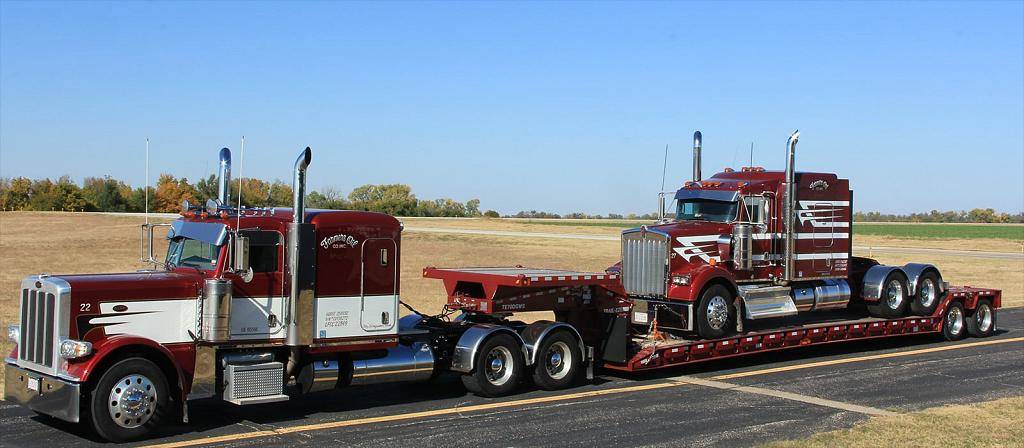 Farmers Oil Peterbilt with a detachable gooseneck lowboy trailer