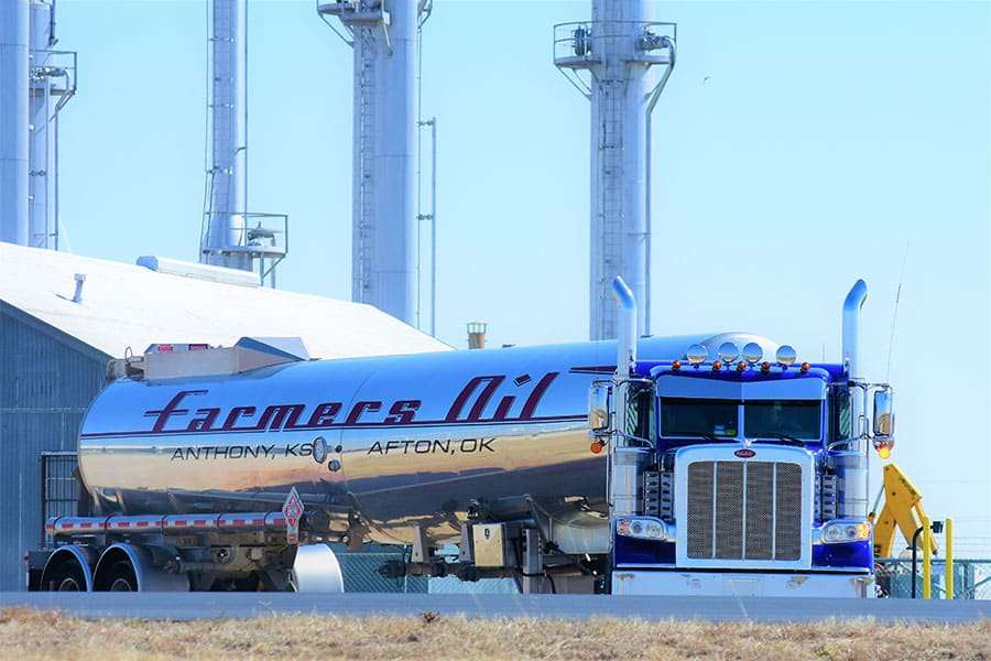 Blue Farmers Oil Peterbilt and chrome tanker lettered Anthony, KS and Afton, OK